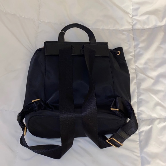 Draw string nylon backpack.